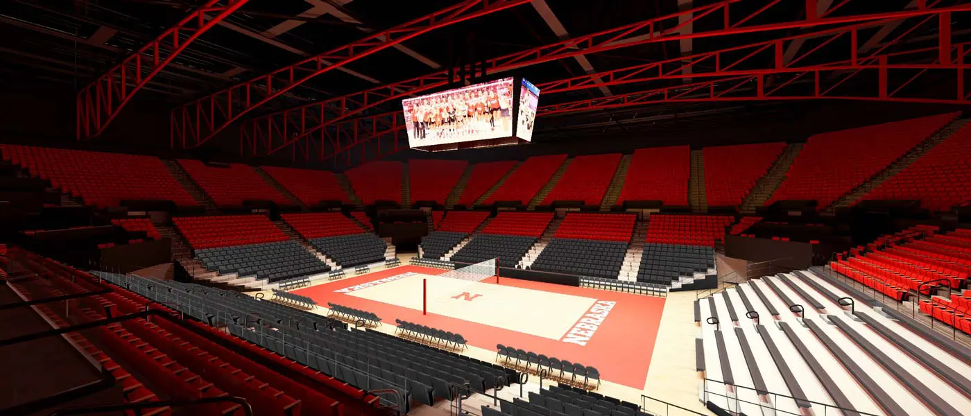 People sitting and listening to a man speaking